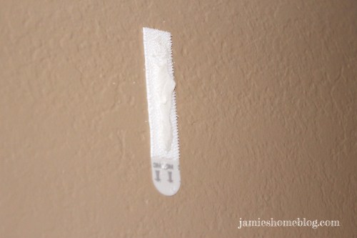 taking down curtains hung up with 3M command strips