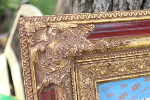 green spray painted ornate antique mirror